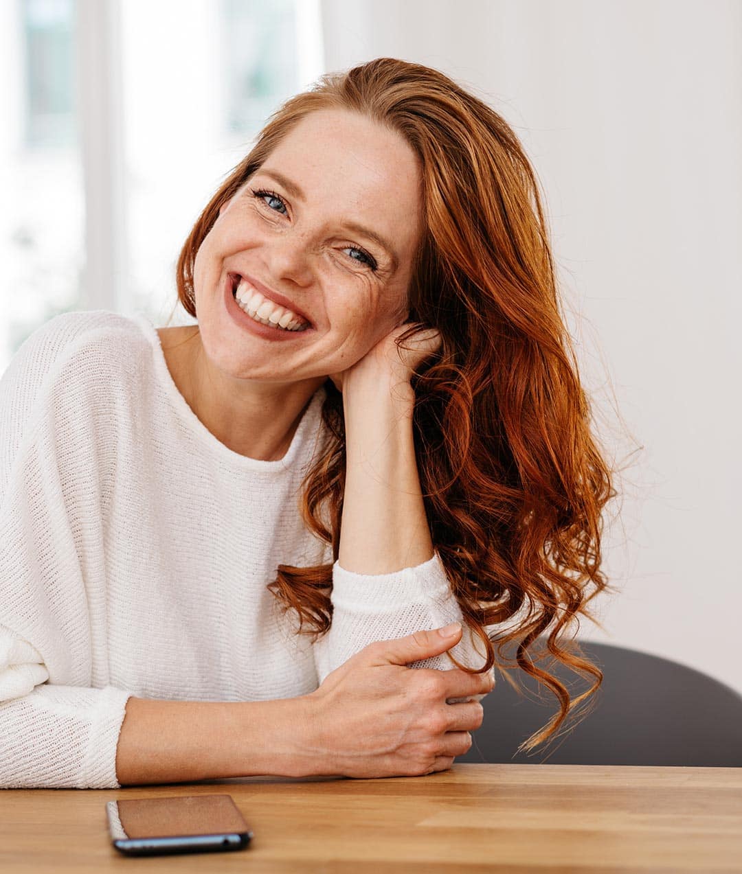 A young woman having a dental exam preformed AT esteem dental studio