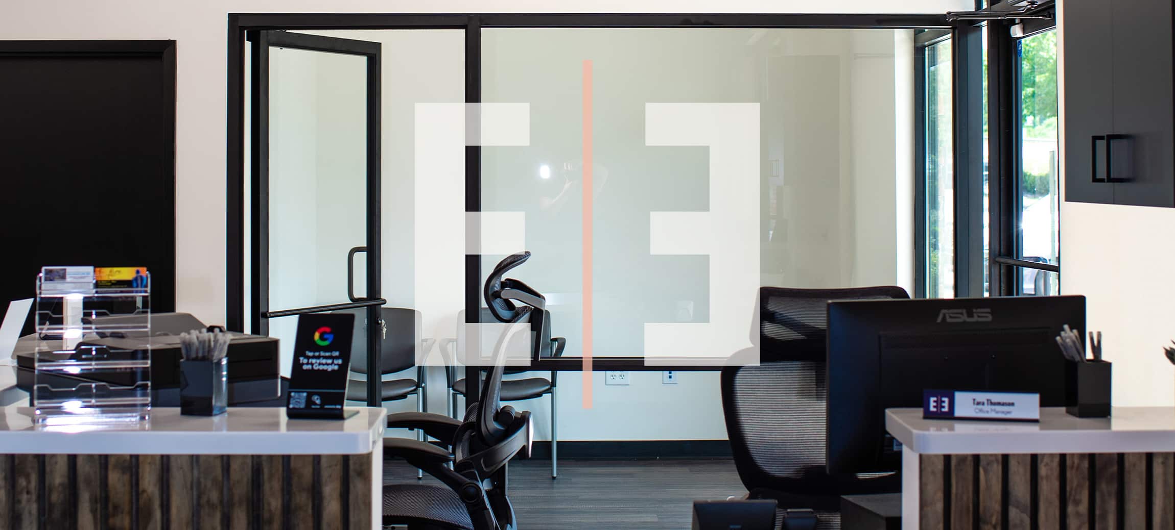 Reception of modern office with lights and wood on the ceiling