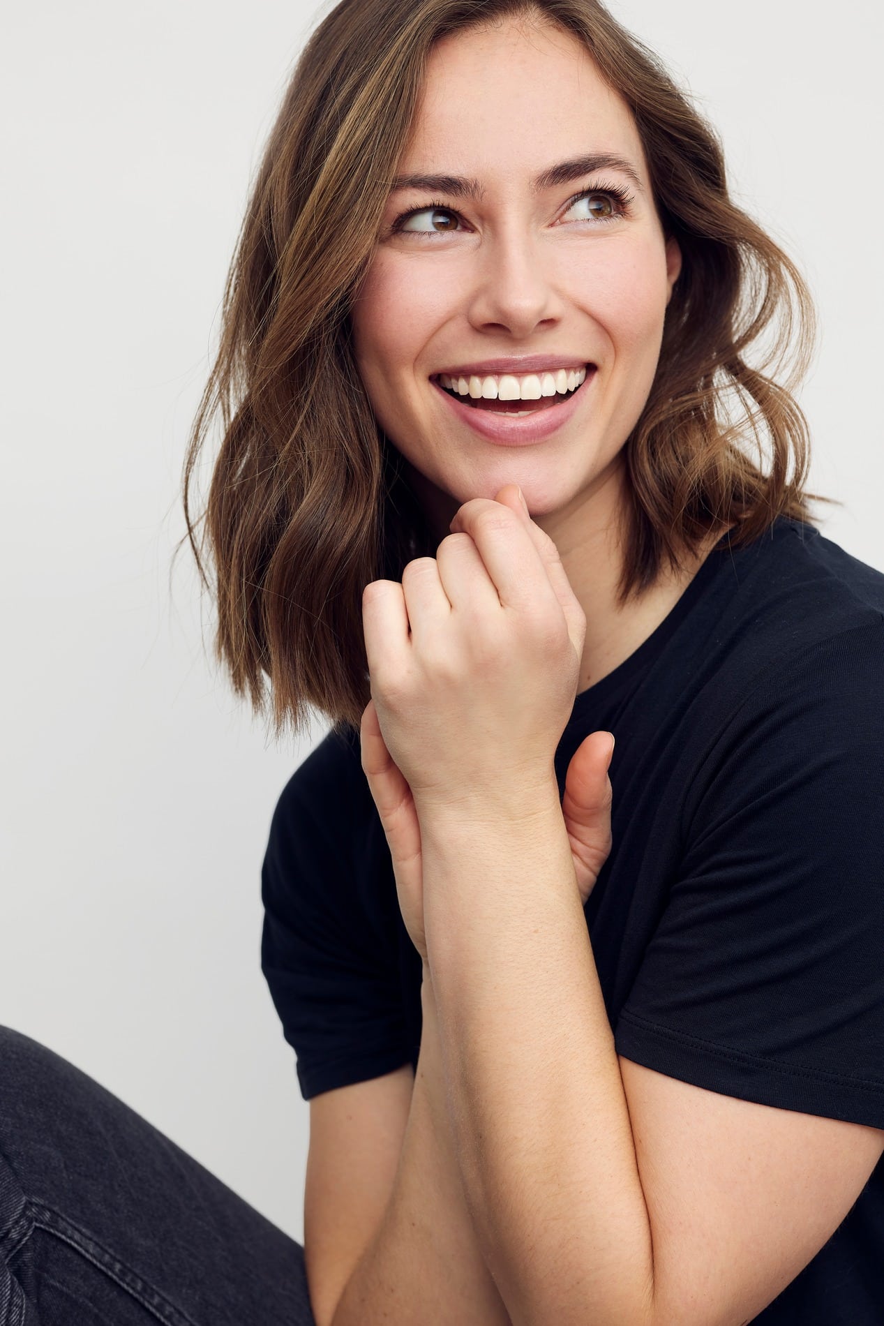 A young woman having a dental exam preformed AT esteem dental studio
