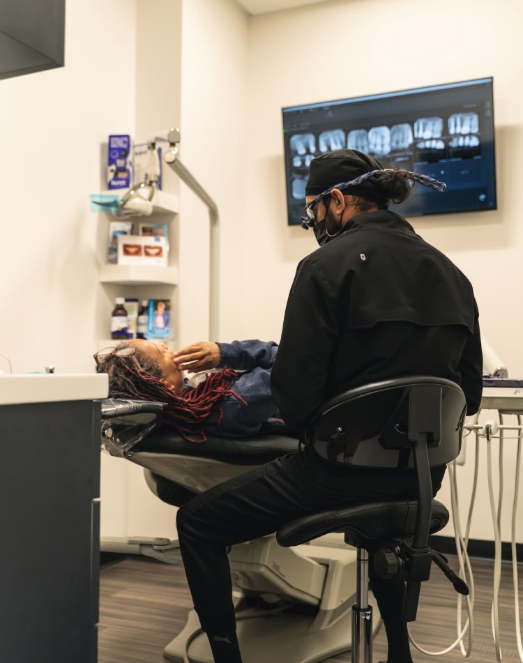 Services_Endodontics Two young female friends laughing together in powder springs ga